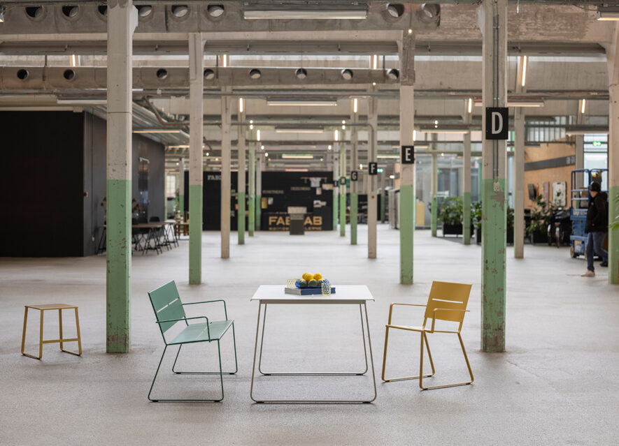 Steel furniture in modern, Danish design grouped in an industrial setting