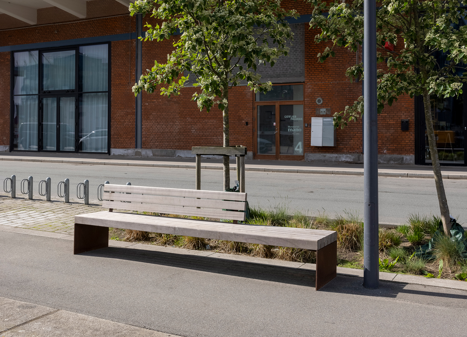 COSI park bench 3000 mm in length is seen in the street