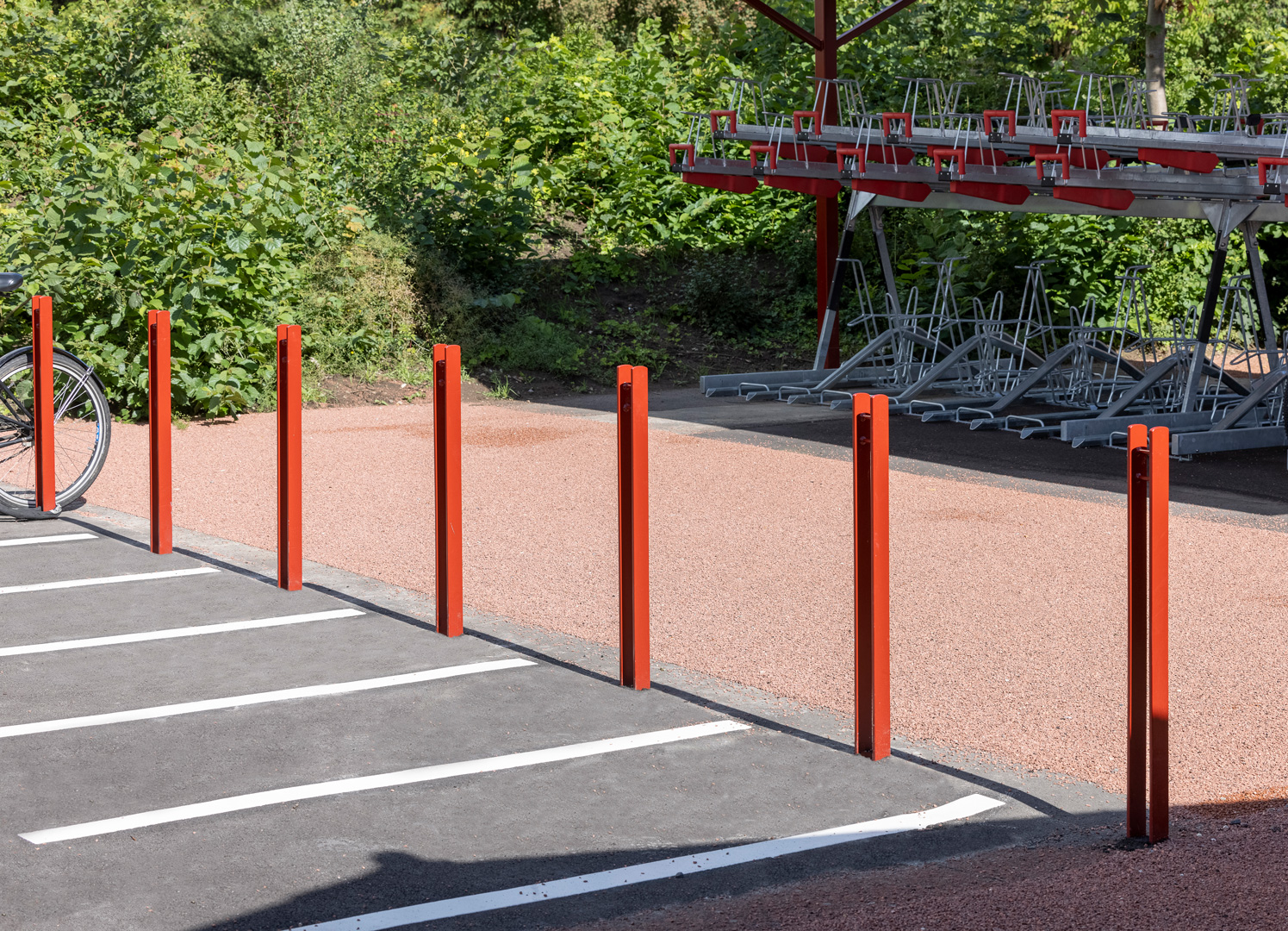 Red bollards for bicycle parking