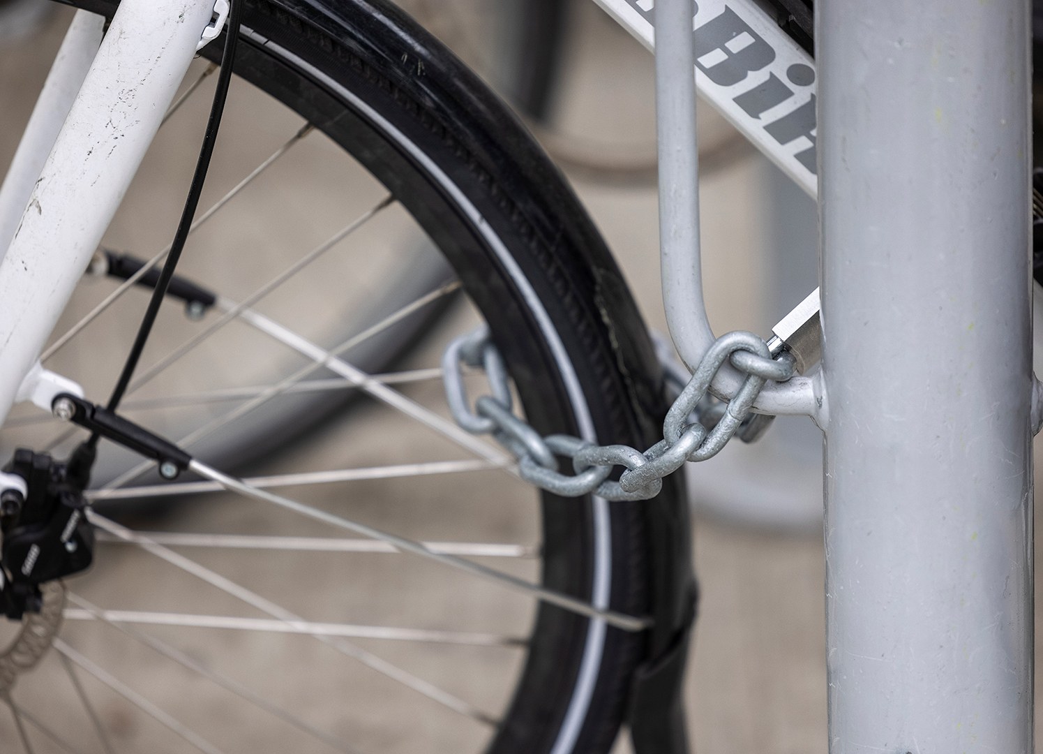 Close-up of bicycle bollard Tor with locking bracket